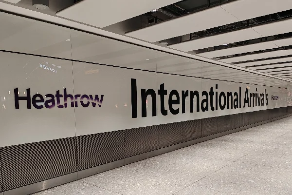 Heathrow Airport terminal sign for luxury chauffeur transfers with Perun Chauffeurs.